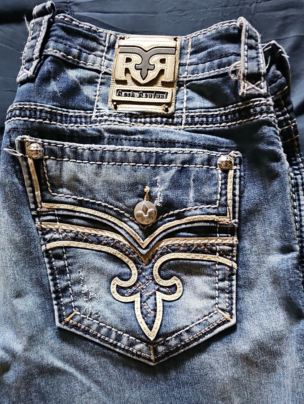 Rock Revival Men’s Dark Blue Embroidered Pocket Jeans with Metal Logo